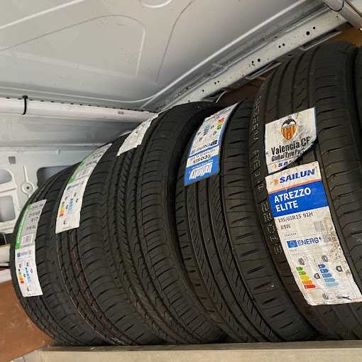New tyres stacked in a mobile tyre fitting van